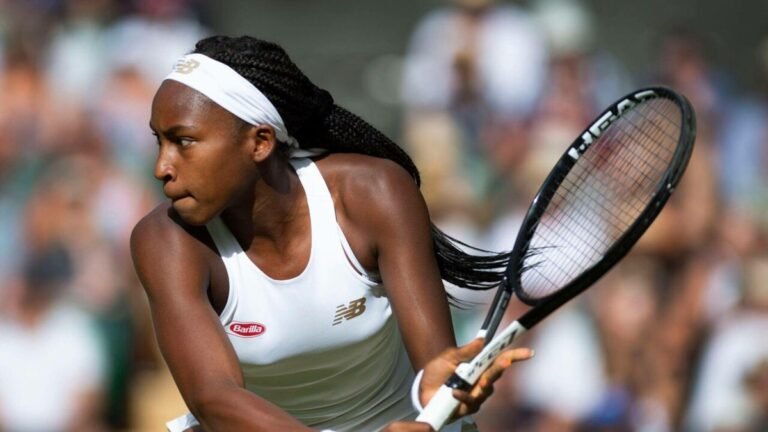 Coco Gauff professional tennis match intense focus action shot 2024