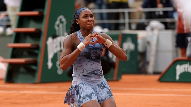 Coco Gauff 2025 Grand Slam final match point celebration action shot